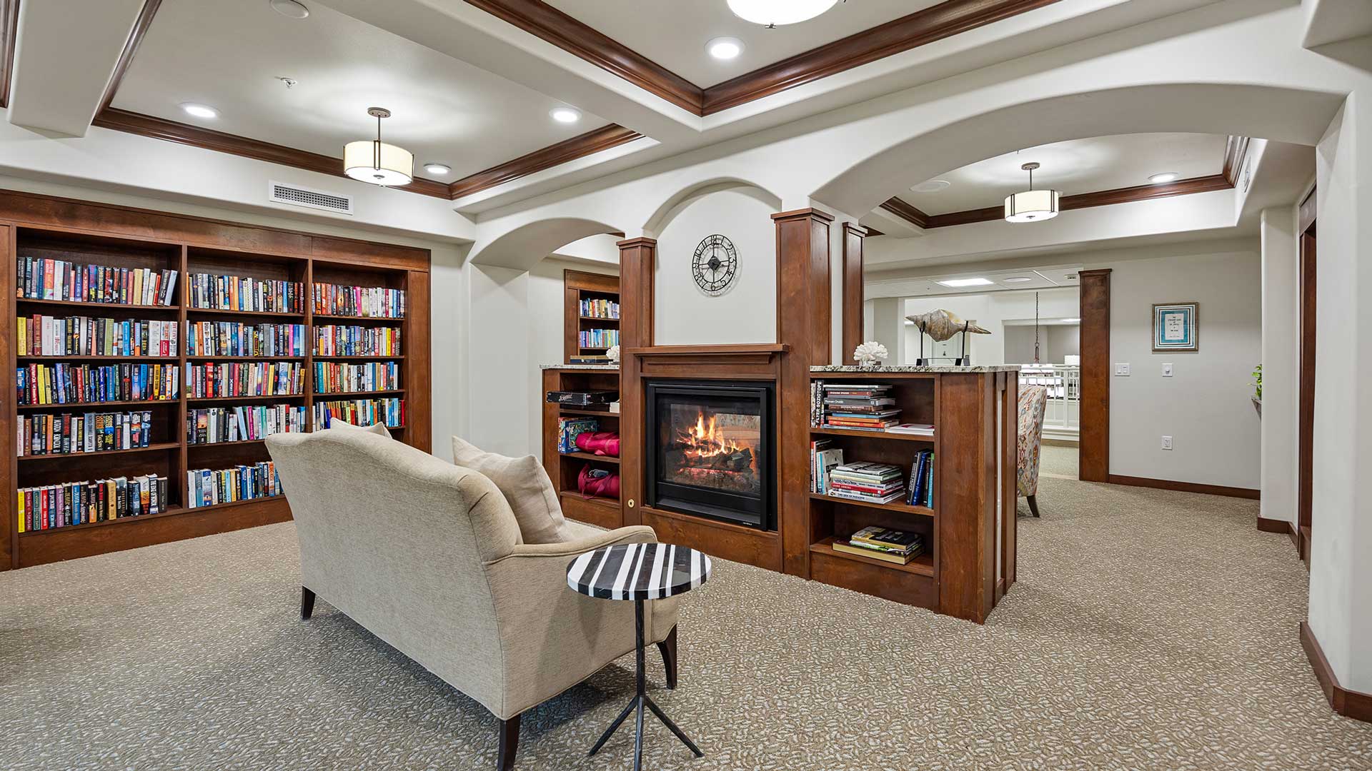 The library at Kennedy Meadows with shelves of books and comfortable seating